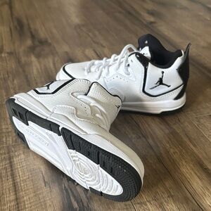 Once-Worn White and Black Jordans
